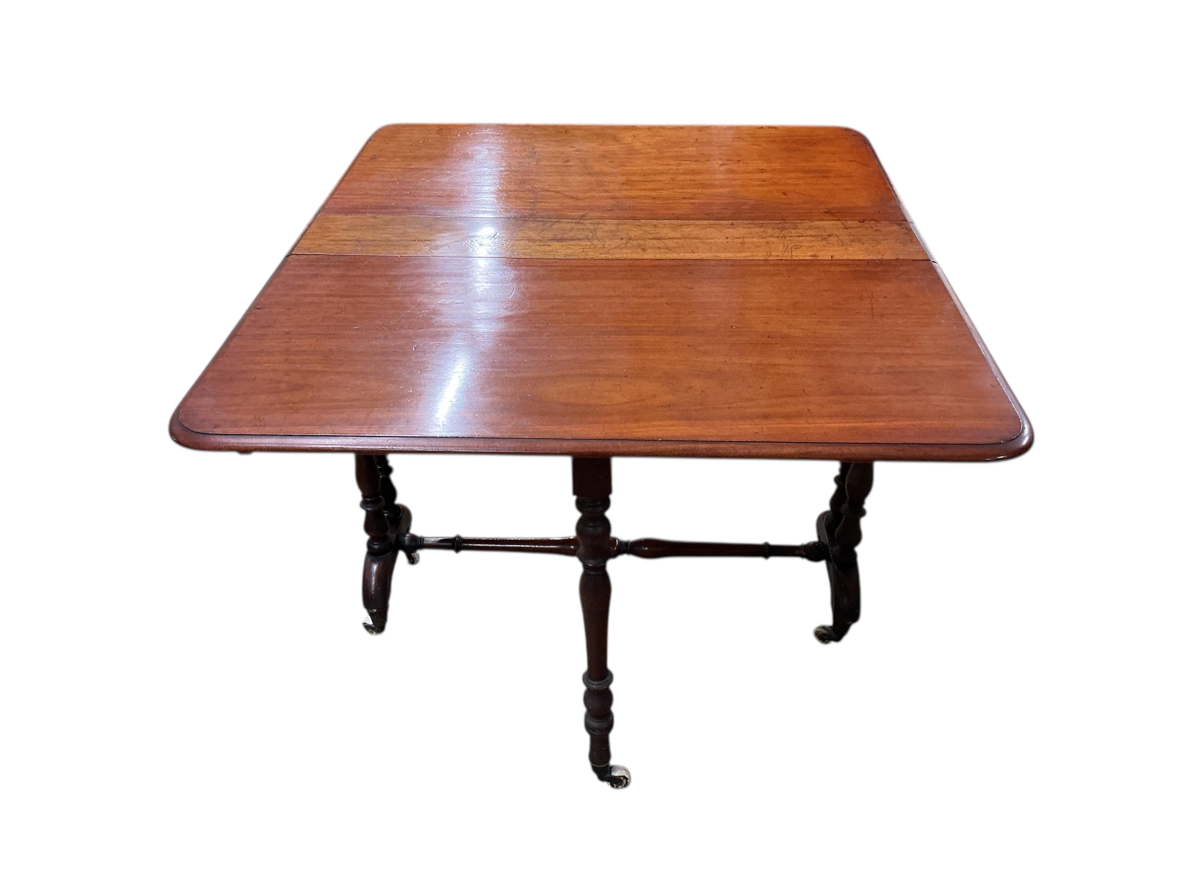 A Victorian mahogany Sutherland table, width 90cm, depth 26cm, height 73cm